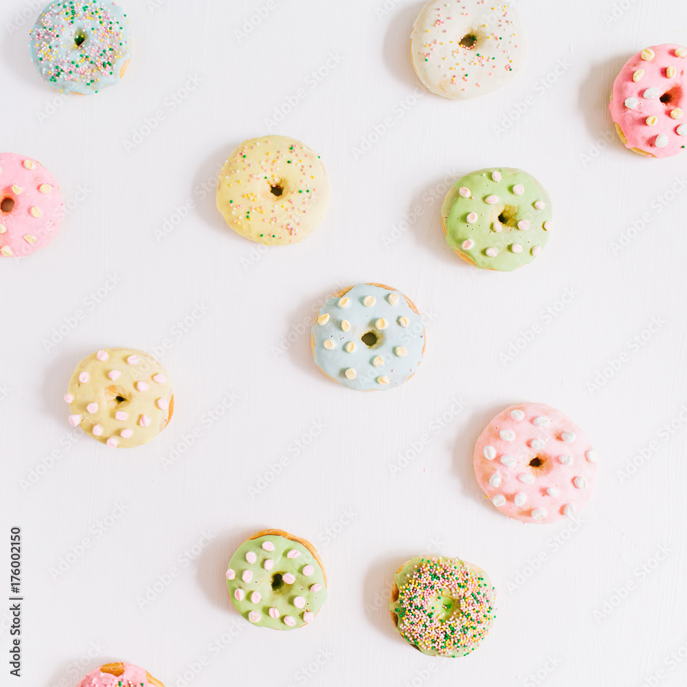 Colorful donuts. Flat lay, top view minimal pattern. Colorful donuts. Flat lay, top view minimal pattern.