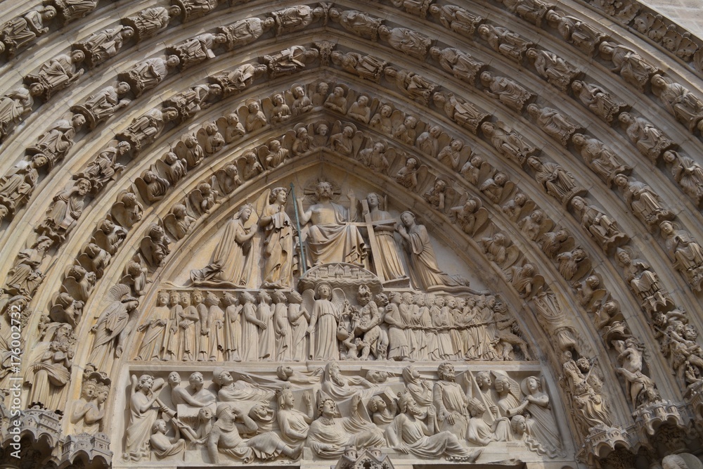 Full frame close-up of a majestic architectural detail from Notre-Dame de Paris Cathedral, Francel
