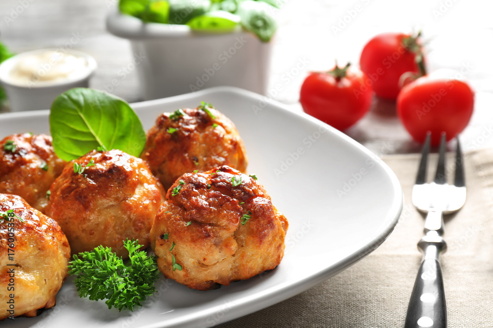 Plate with delicious meatballs on table Plate with delicious meatballs on table