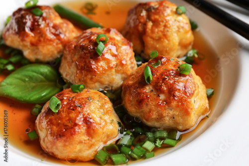 Delicious meatballs with sauce in plate