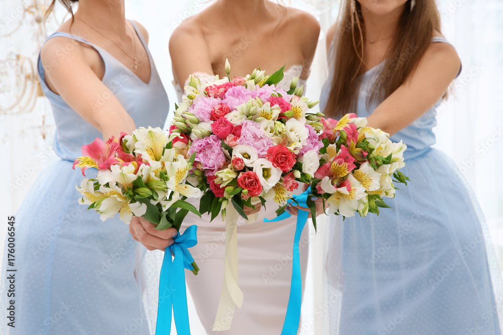Happy beautiful bride with bridesmaids on wedding day Happy beautiful bride with bridesmaids on wedding day