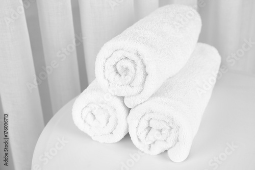 Clean white towels on table