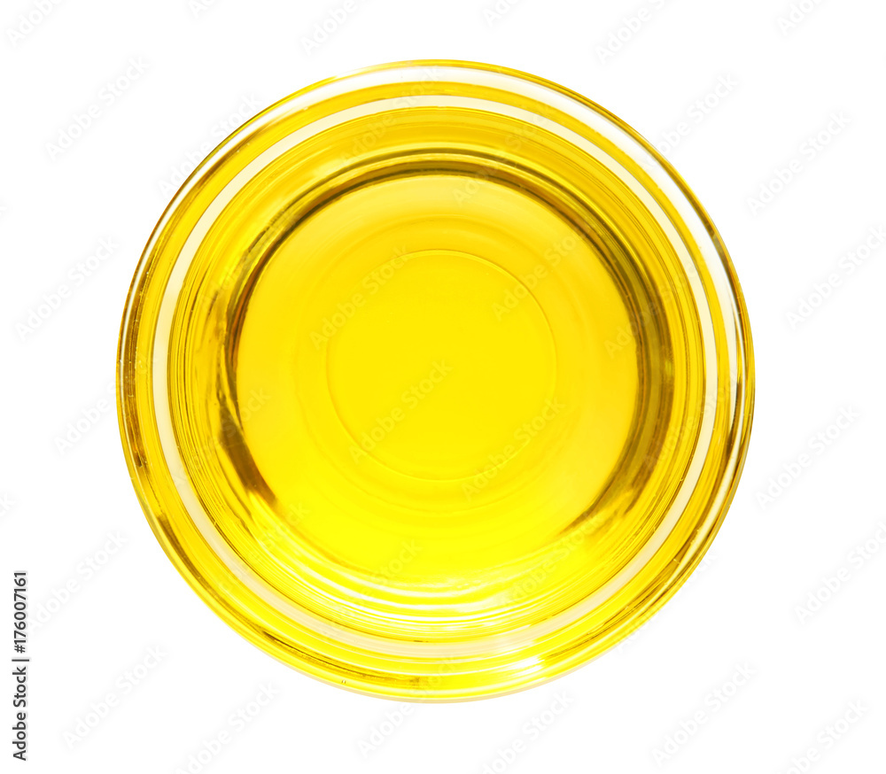 Glass bowl with cooking oil on white background Glass bowl with cooking oil on white background