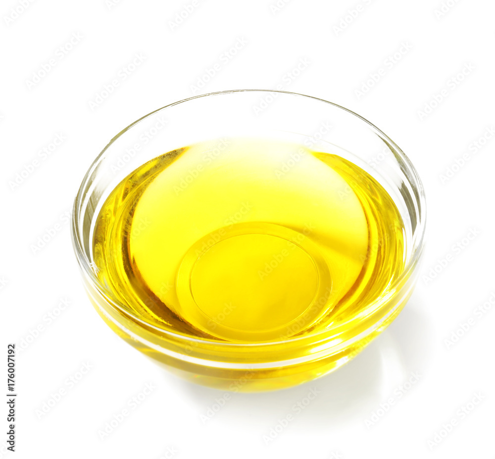 Glass bowl with cooking oil on white background Glass bowl with cooking oil on white background