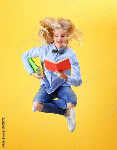 Jumping teenager girl with ...