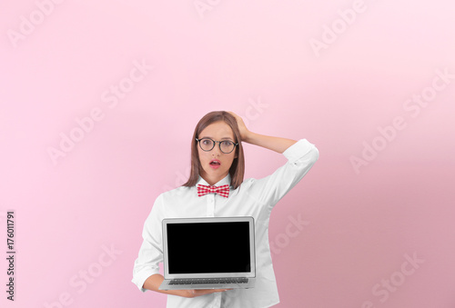 Teenager girl with laptop o...