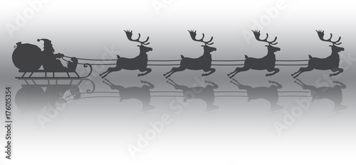 Babbo natale che corre sulla slitta con le renne a portare i regali