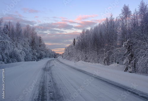 Beautiful snowy road in winter landscape