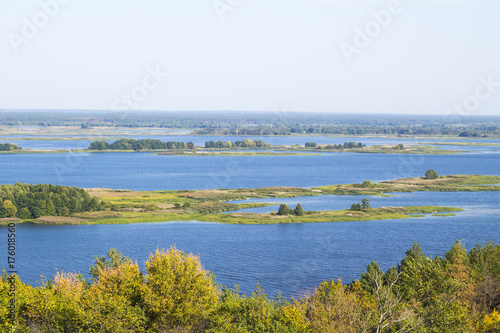 Beautiful summer landscape, small river panorama with trees © lnsdes