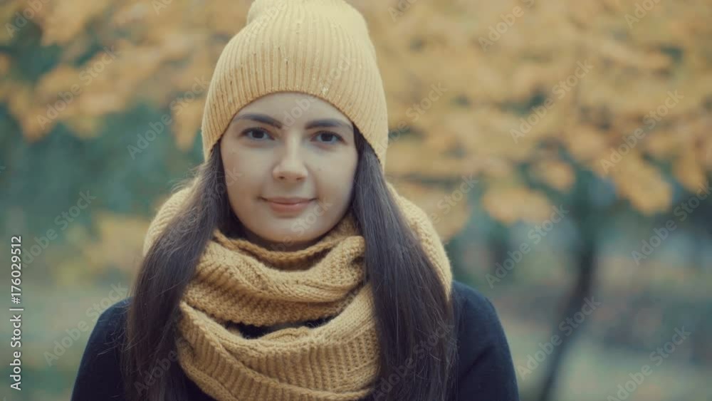portrait of a beautiful girl in a park in autumn. portrait of a beautiful girl in a park in autumn.