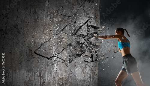 Young boxer woman . Mixed m...
