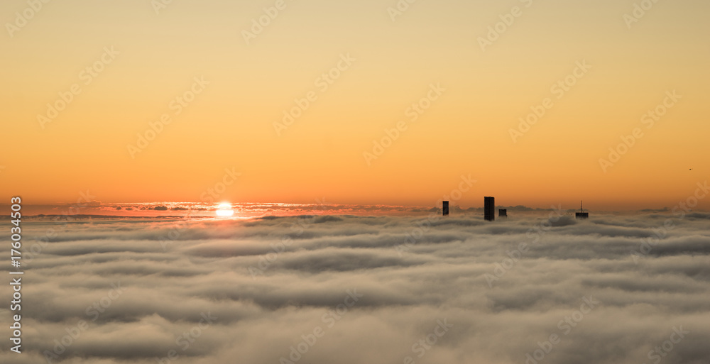 A foggy dawn over Brisbane city