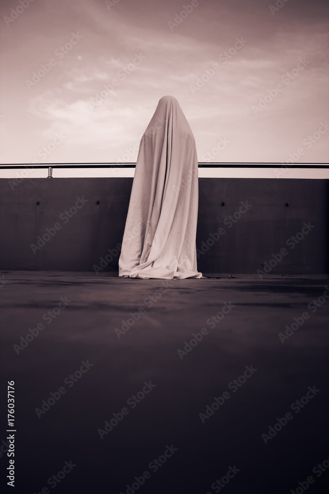 Ghost in white costume for halloween Ghost in white costume for halloween