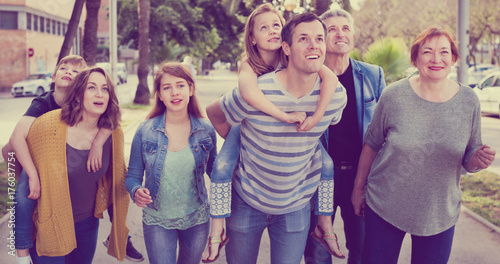 Friendly family going in the park together