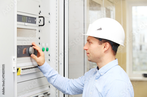 Engineer checking power plant parameters
