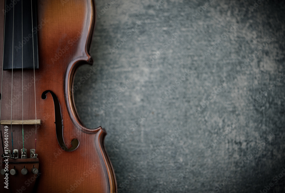 Fototapeta premium vintage violin on concrete background