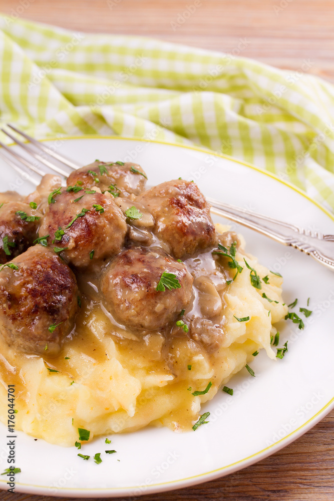 Beef meatballs with mushroom gravy on mashed potato Beef meatballs with mushroom gravy on mashed potato