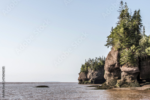 famous Hopewell Rocks geologigal formations at low tide biggest tidal wave Fundy Bay New Brunswick Canada