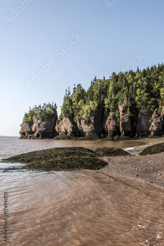 famous Hopewell Rocks geologigal formations at low tide biggest tidal wave Fundy Bay New Brunswick Canada