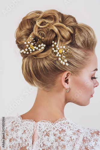 Close up bridal hair style with pearls hair pins