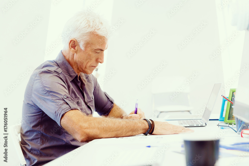 Handsome businessman in office Handsome businessman in office