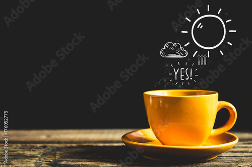 Black coffee in yellow coffee cup, Put on an old wood table.