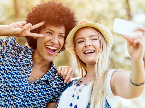 Two women friends in park photo