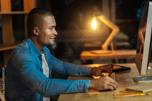 Attentive man playing computer games