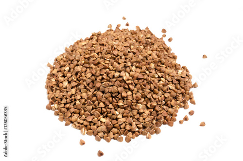 Scattering of buckwheat on white background