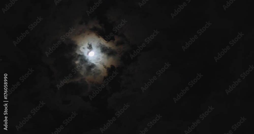 time-lapse, dark night dramatic sky with moon light and moving clouds time-lapse, dark night dramatic sky with moon light and moving clouds