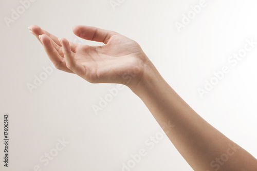 Woman hand on white