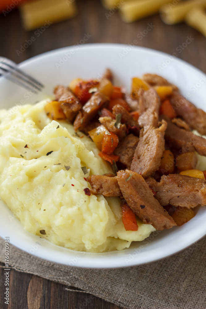 Soy meat with potato puree over kitchen table. Soy meat with potato puree over kitchen table.