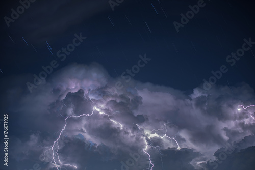 Lightning in storm cloud, Star on the sky