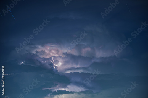 Lightning in storm cloud, Star on the sky