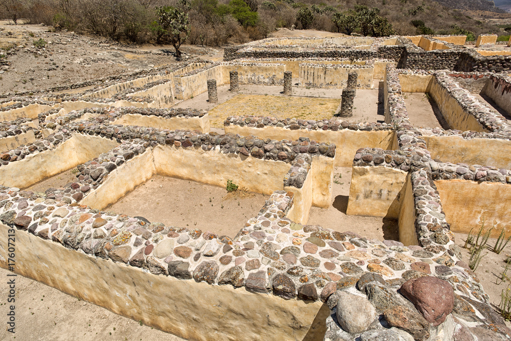 a labyrinthine structure forming an intricate complex of passageways and many rooms at the ruins of Yagul Oaxaca Mexico