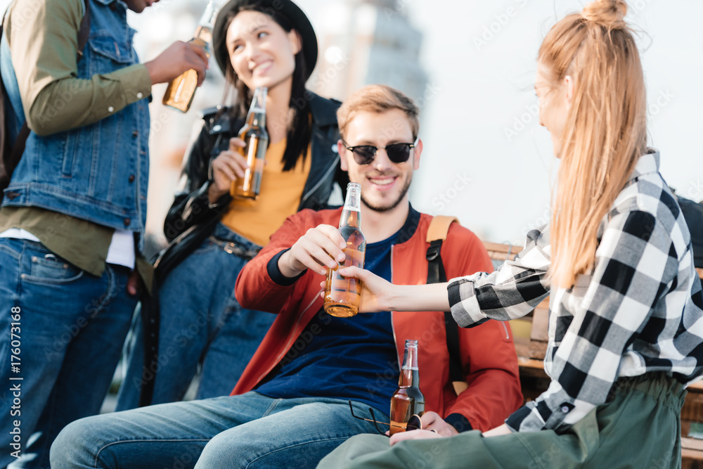 Fototapeta premium multicultural friends with drinks
