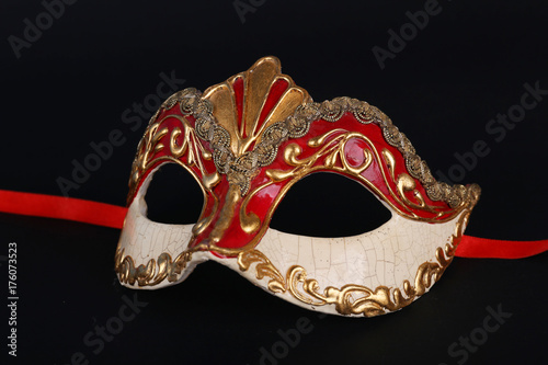 Venetian carnival mask on black background