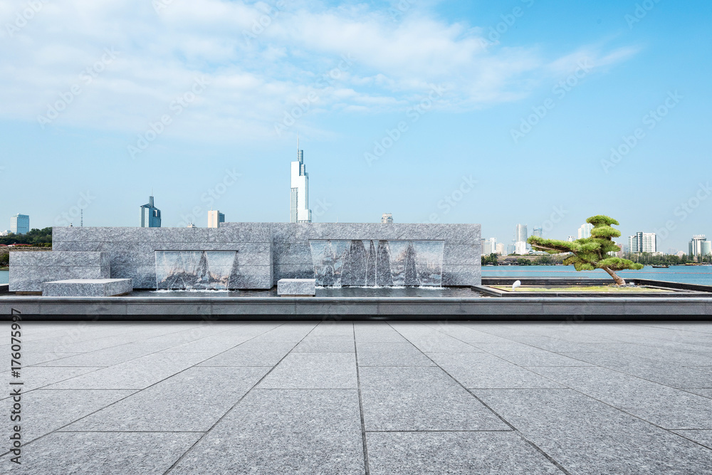 Fototapeta premium empty marble floor with decorative waterfall