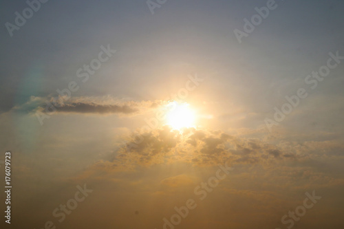 View of sun in sky with golgen background