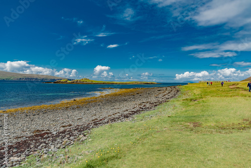 lands between sea and sky with green meadows of Scotland in England