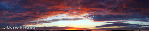  landscape panorama with blue sky, clouds and sunset. © yanikap