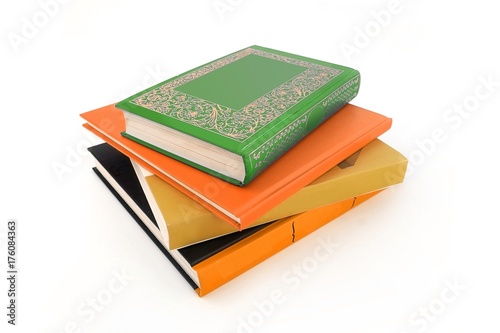 Stack of books on white background