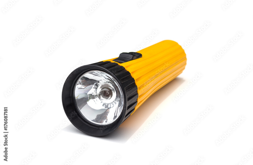 yellow electric flashlight with simple design isolate on white background yellow electric flashlight with simple design isolate on white background
