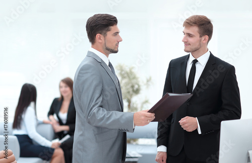 Manager conveys to the employee the documents in the office