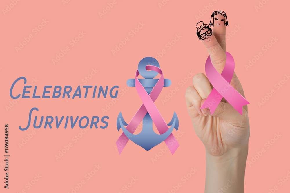 Composite image of cropped hand holding breast cancer awareness Composite image of cropped hand holding breast cancer awareness
