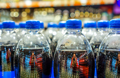Many bottles with pepsi top view. background made by big pepsi bottles
