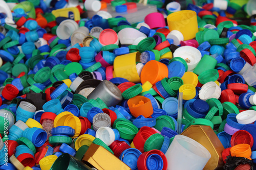 Huge number of colorful plastic bottles tops detail
