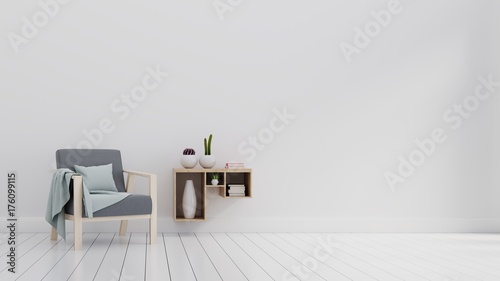 Modern living room with gray armchair and shelf on white wall background with free space on right. 3d rendering. © Vanit่jan
