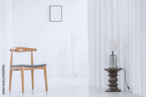Wooden chair in bright hall
