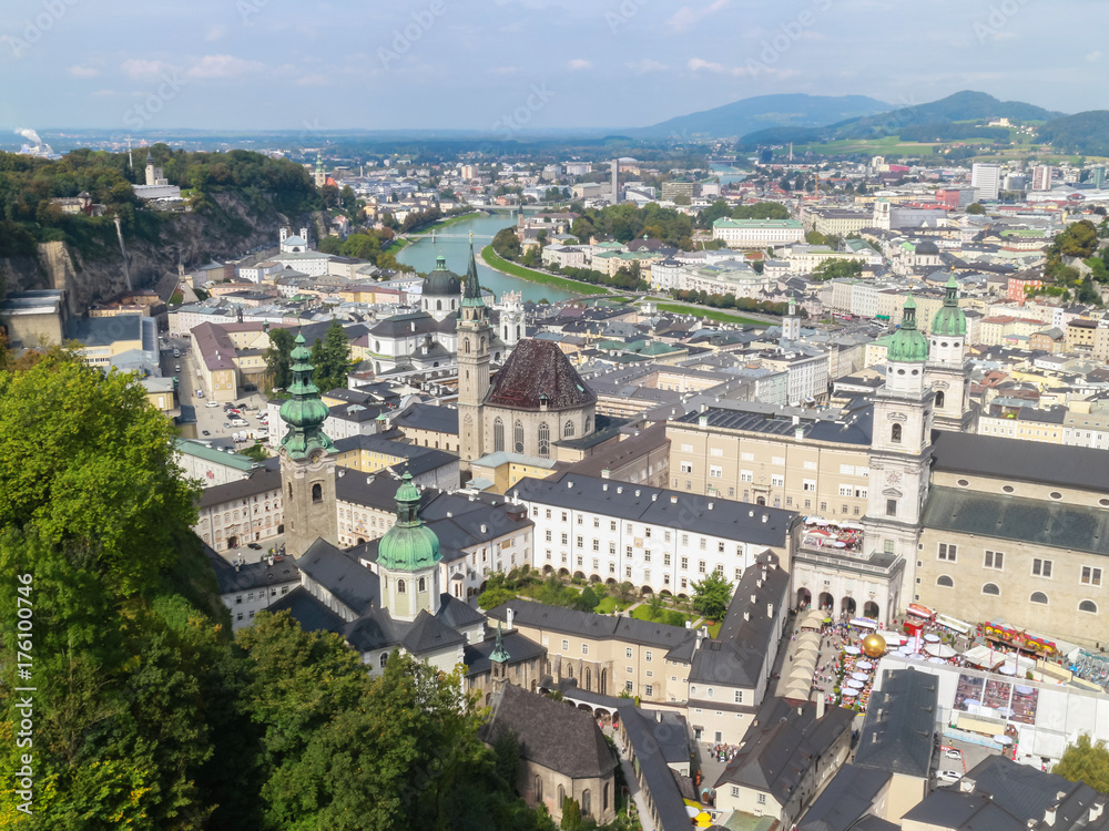 Bird eye view from the walls of the fortress of the Salzach river and the old city in center of Salzburg, Austria